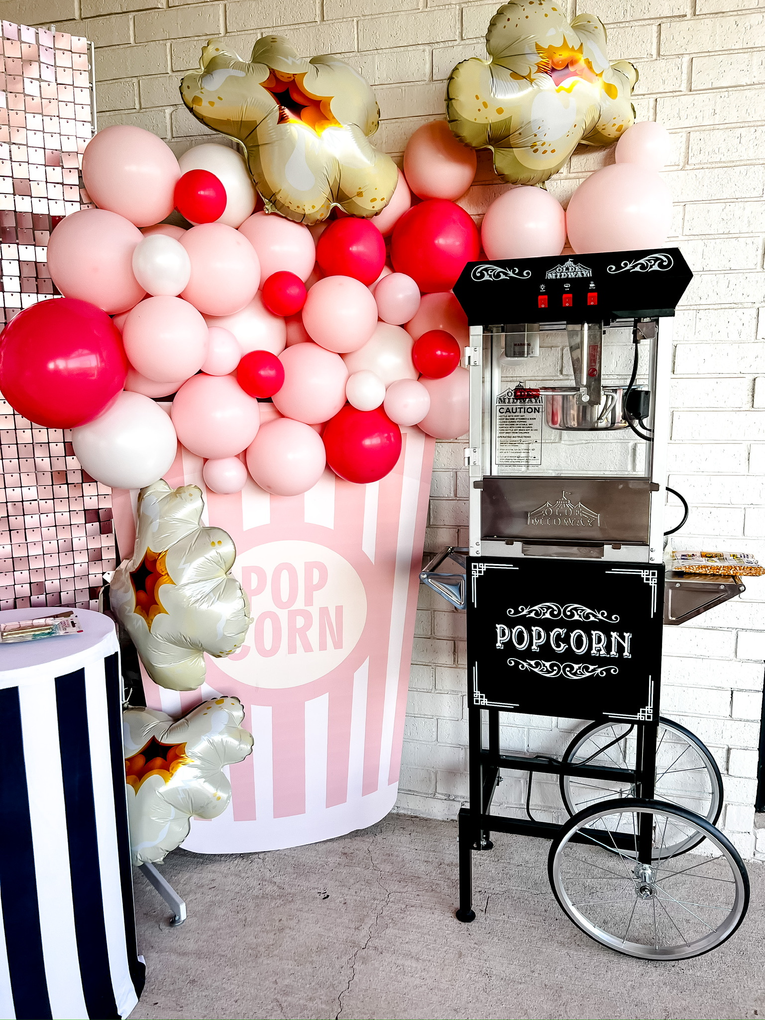 movie night, movie night themed party, movie night decor, movie camera balloons, popcorn balloons, vintage popcorn machine, large number 8 LED sign