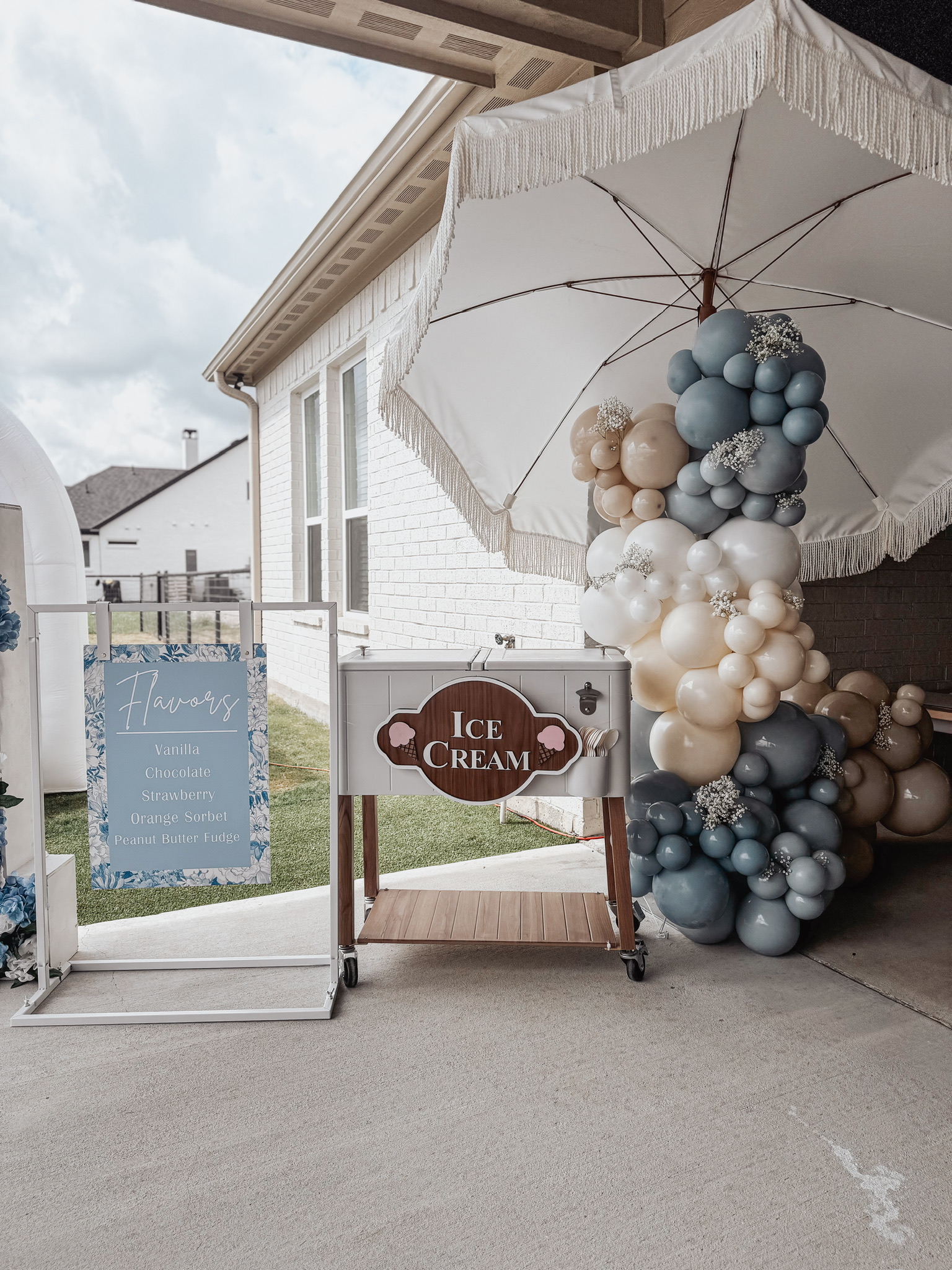 Ice cream, menu, cart and umbrella centerpiece