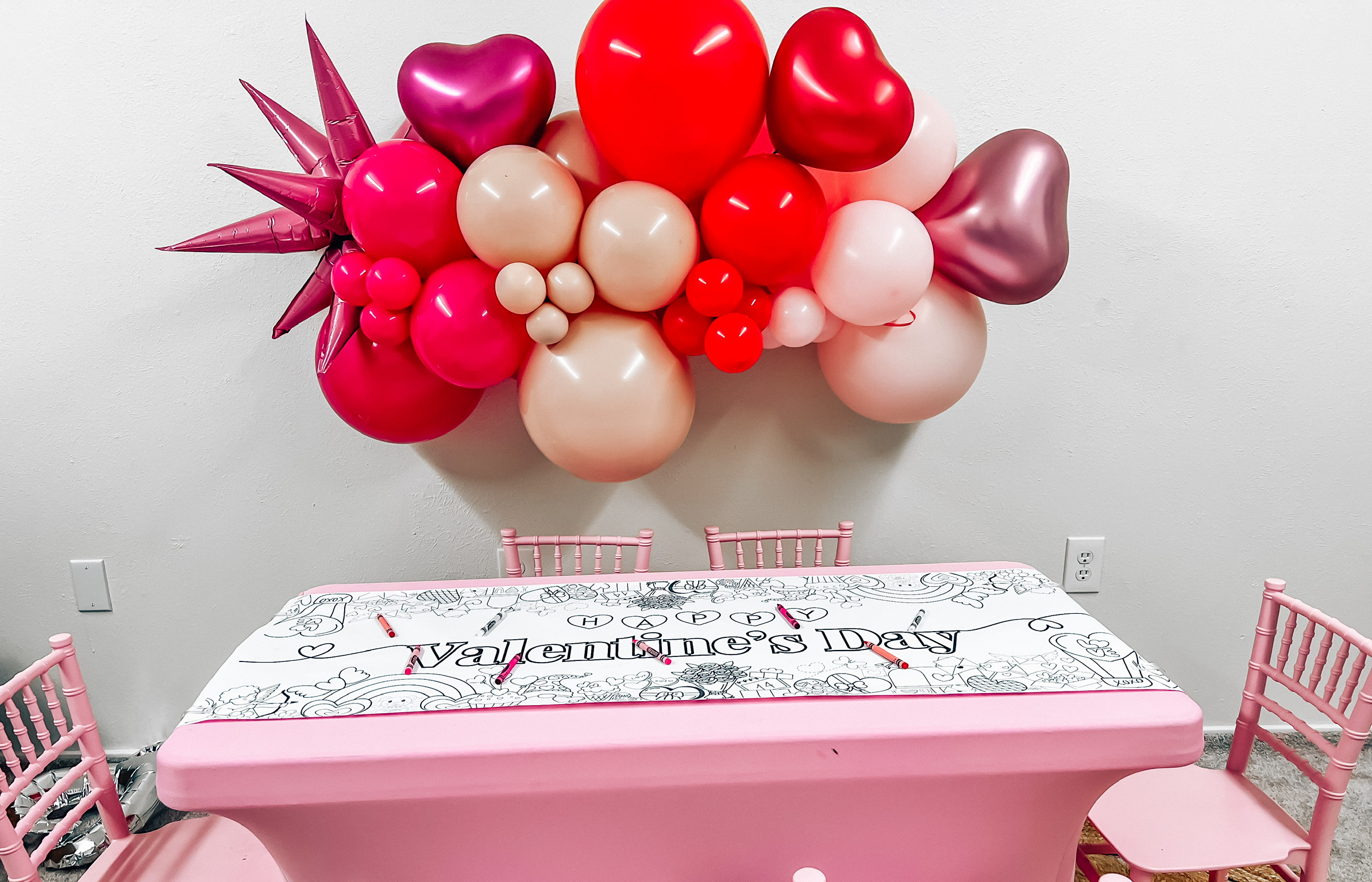 valentine's day blog, valentine's day decor, galentines party, valentines party, balloons, pink balloons, valentines balloons, red balloons, pink chairs, pink table